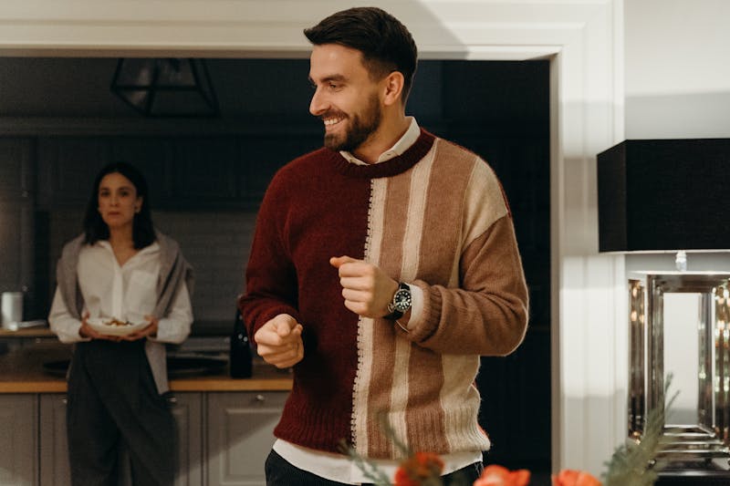 Head chef Marco crafting a pizza in the kitchen